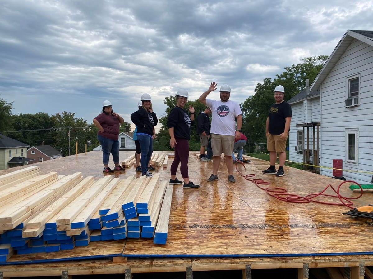 Group photo of Phelps volunteers at the build site.