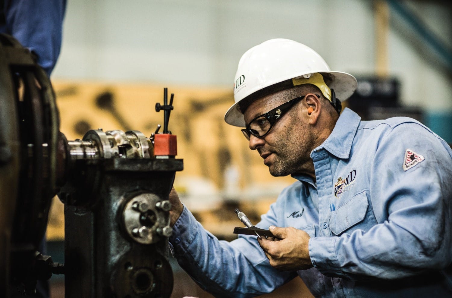 Maintenance wearing Phelps work uniform