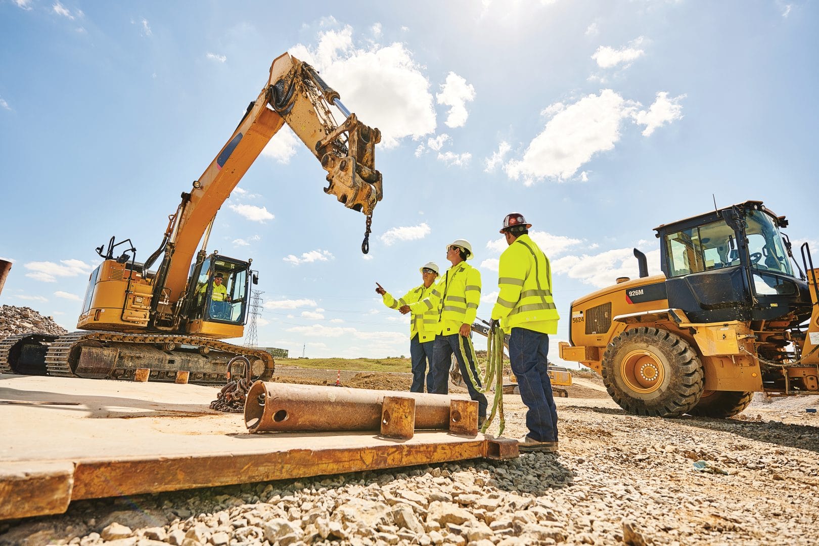 PPE products keeping construction workers safe with High-Visibility and hard hats.