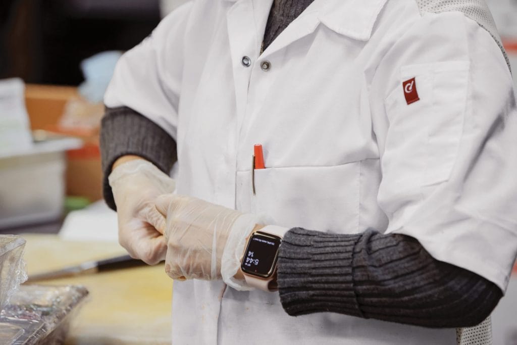 Restaurant uniforms and PPE safety within the kitchen.