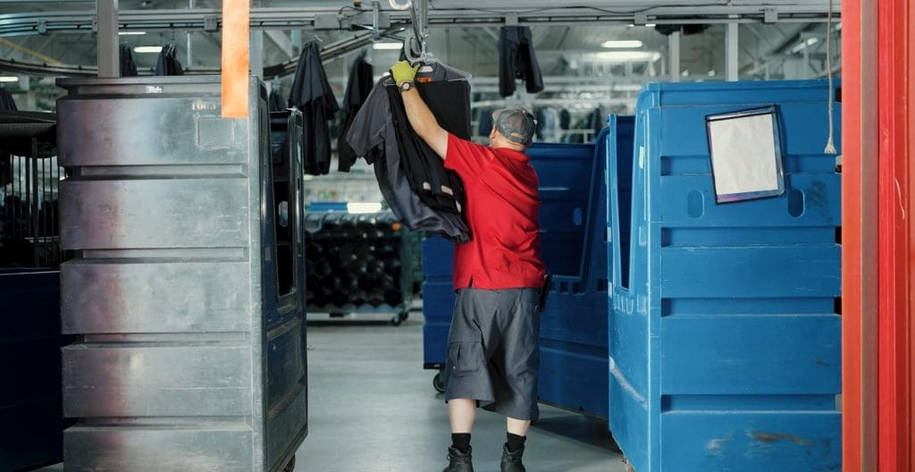 Phelps route driver loading uniforms for delivery